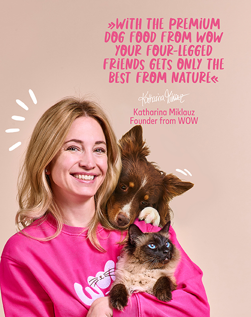 A banner on which Katharina Miklauz is pictured with a puppy and on which the following statement is written: With the premium dog food from WOW your four-legged friend gets only the best from nature.